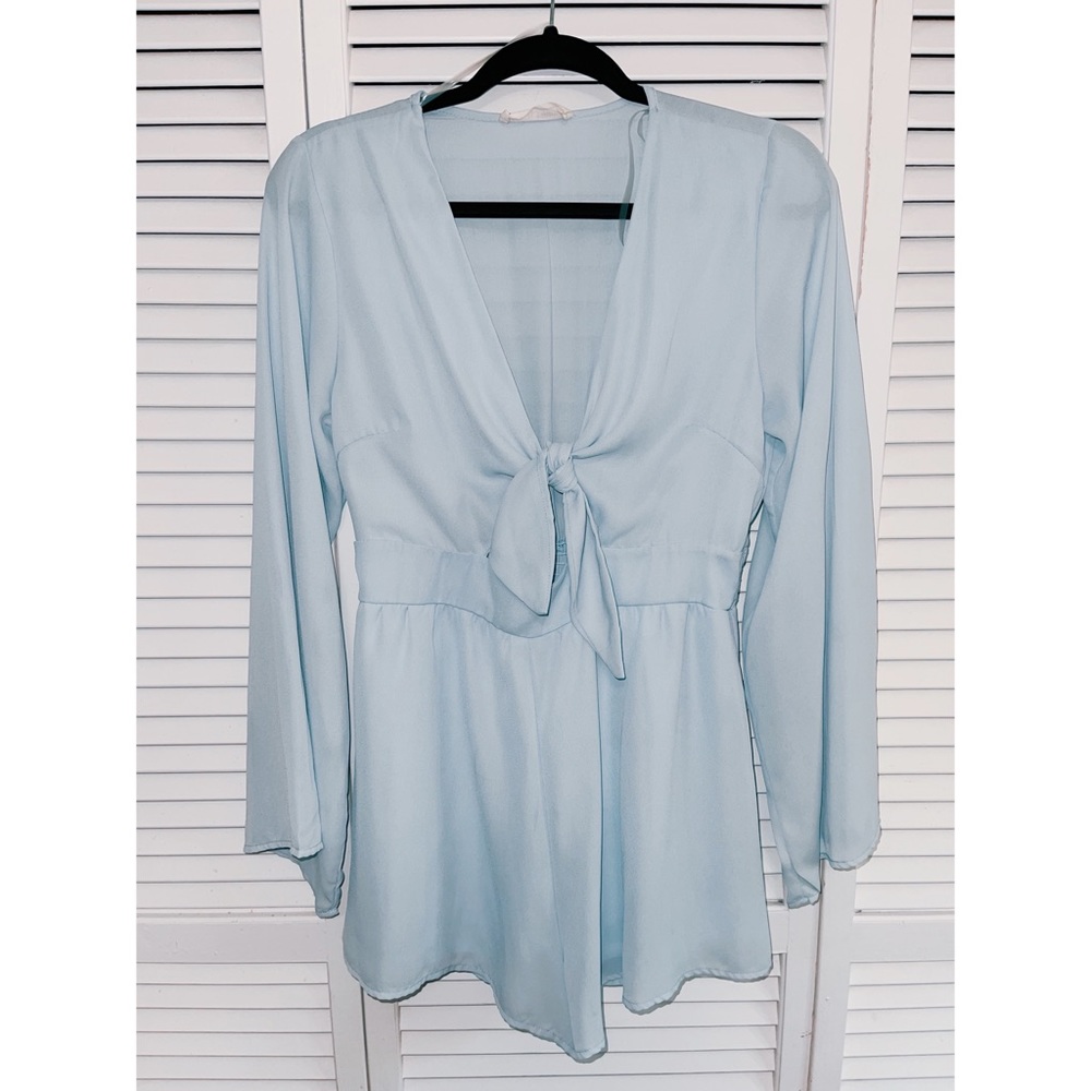Light baby blue romper with tie front.